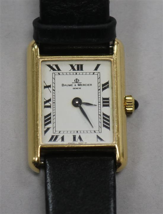 A ladys 18ct gold Baume & Mercier rectangular dial manual wind wrist watch.